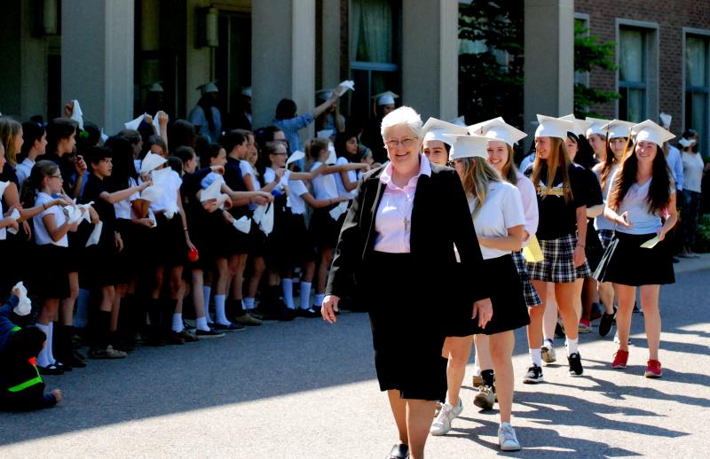 Sr. Bridget Bearss, RSCJ, outgoing head of school at the Academy of the Sacred Heart in Bloomfield Hills, leads the class of 2016 in a senior sendoff ceremony at the end of the school year. Teaching Faith, Not Fear, to Generations of Students