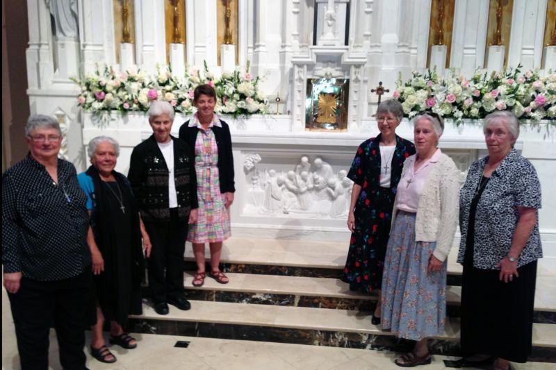 RSCJ at St. John Berchmans Altar at Shreveport Cathedral