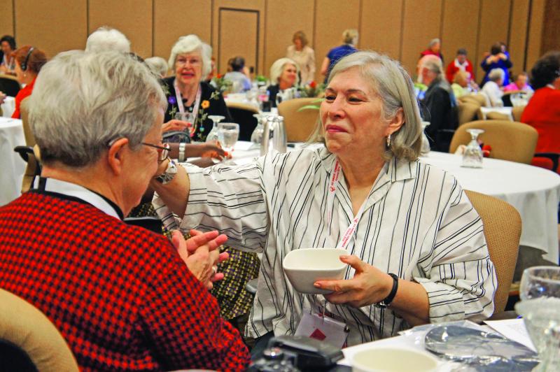 Mary Forsyth offers Sr. Shirley Miller a blessing at the AMASC Congress last year