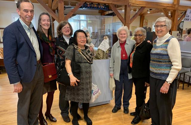 From left to right: Tom Farquhar (Museum Board, Sidwell Friends School Head) Mary Grady (his wife, quilt artist), Susan,  Linda Kato, RSCJ; Calre Pratt, RSCJ; Joan Ewing, RSCJ; Pat Geuting, RSCJ, at the Sandy Spring Museum